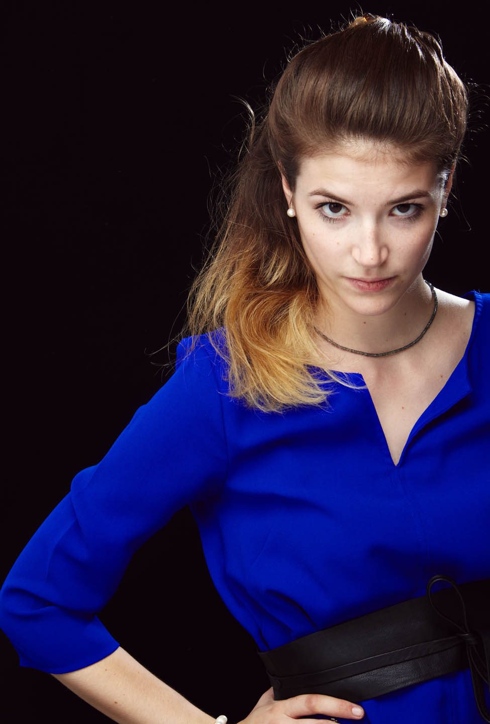 Studio portrait, blue dress
